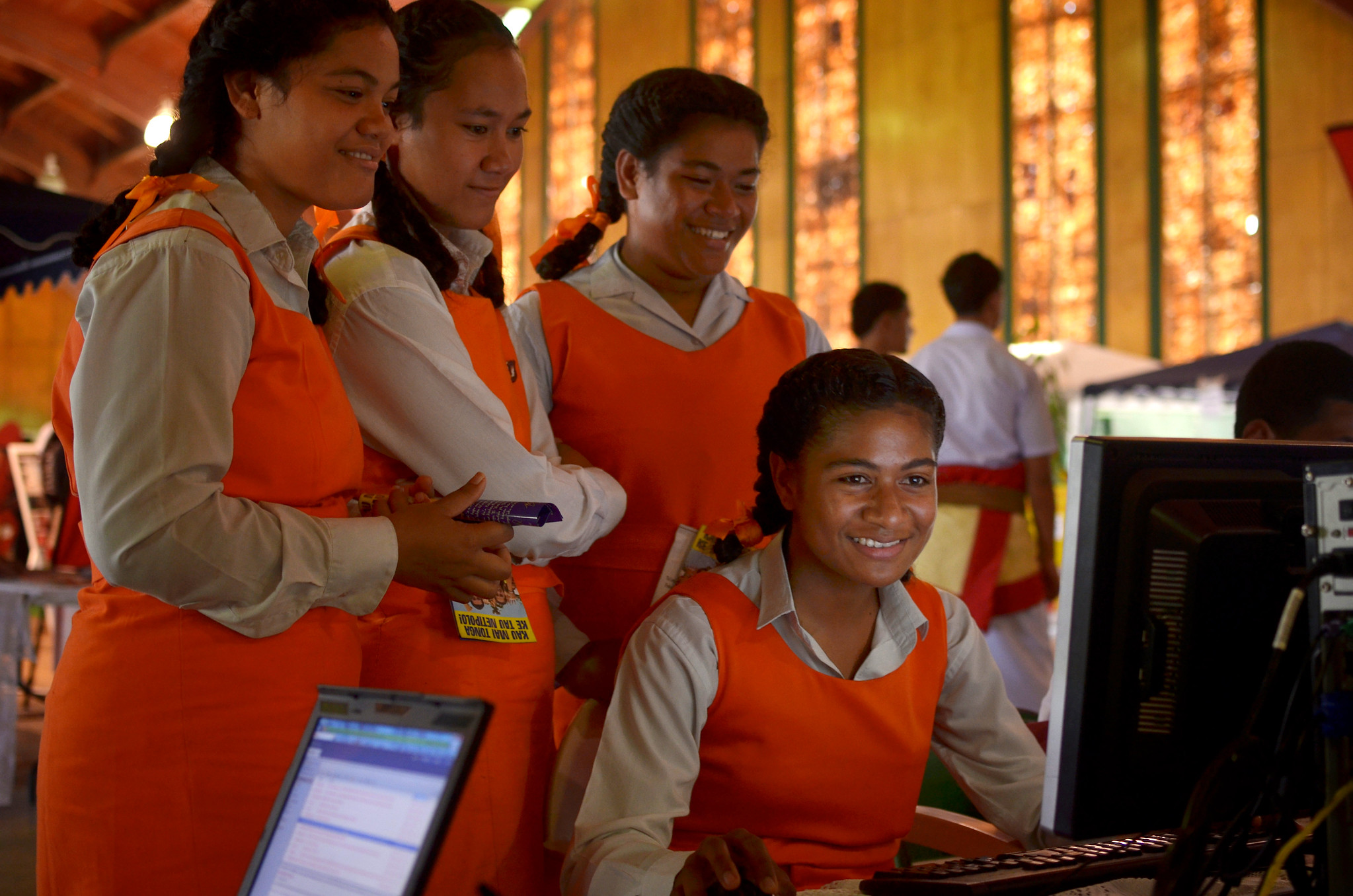 Students from Tonga's Tailulu College making the most of new high-speed broadband services at 2013 World Telecommunication and Information Society Day celebrations in the the Tongan capital, Nuku'alofa. Nukua'lofa, Tonga. Photo: World Bank/Tom Perry