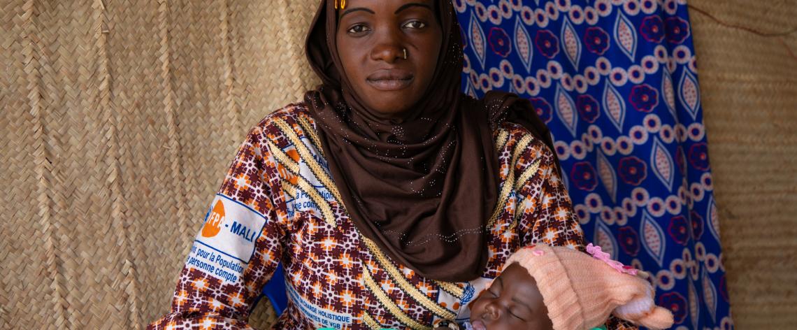 New mother, Fatoumata, and her child in Mali, 24 January 2024. Since the 1994 International Conference on Population and Development, maternal mortality has declined 34 per cent and child mortality has been cut in half. ? UNFPA Mali/Amadou Maiga